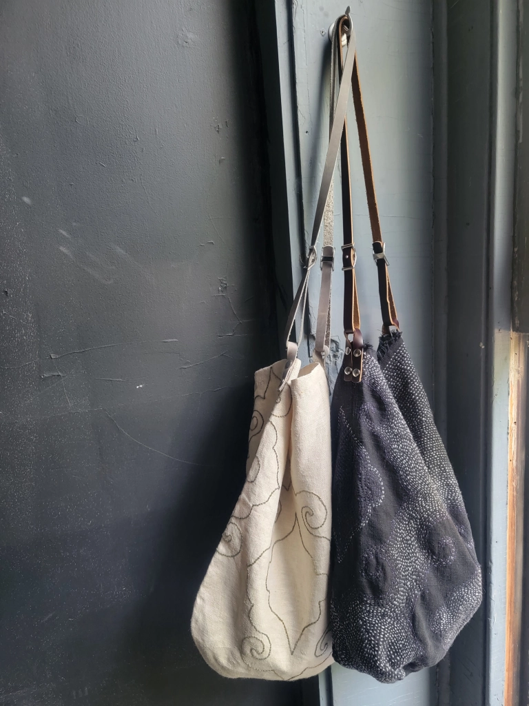 Trunk mini topstitched glossed-leather shoulder bag